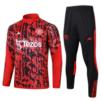 Манчестер Юнайтед тренировочный костюм 2023/24 красно-чёрный с узорами